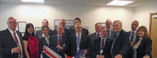 The Frequentis UK team with Sonja Holocher-Ertl, the Deputy Austrian Trade Commissioner (third from left), Georg Karabaczek, The Austrian Trade Commissioner (fourth from left on front row), and Vince Cable, MP (second from right on front row).