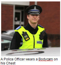 A Police Officer wears a Bodycam on  his Chest