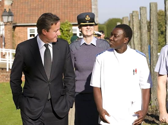Prime Minister David Cameron MP speaks to a member of staff at the Defence Medical Rehabilitation Centre (DMRC) Headley Court on the 21 October 2011. Pictured next to the Prime Minister is Group Captain Clare Walton RAF, Commanding Officer of DMRC Headley Court. Right of the Picture is Staff Nurse Nivanai Ndoro a Nurse at Headley Court. Picture: SAC Andy Holmes/MoD.