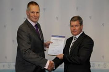 David Westwood (left) is pictured presenting Nick Riley with his Bosch Security Academy Certificate.